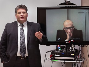 David Musyj, president, CEO, Windsor Regional Hospital speaks during a media conference on Thursday, March 3, 2016, as Dr. Bob Kiaii, chief of cardiac surgery at London Health Sciences Centre is shown on a video monitor. The WRH Ouellette campus may soon have a cardiac surgery clinic. (DAN JANISSE / Windsor Star)