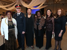 From left, Daphne Clarke,  Windsor Police Chief Al Frederick,  Sheila Barker, Hon. Jean Augustine, Rose Anguiano Hurst, and Gemma Gray-Hall during the 2016 International Women's Day gala held at the St. Clair Centre for the Arts on March 8, 2016 in Windsor, Ontario. The event was hosted by the Women's Enterprise Skills Training while  celebrating International Women's Day 2016. (JASON KRYK/WINDSOR STAR)