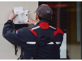 A spokesman for Canada Post said recently that home delivery to an entire neighbourhood on Lillian Street and Howard Avenue has been suspended "due to three dogs loose that were chasing our delivery agent."