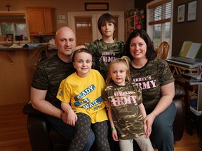 Ray, Abbey, Nathan, Emily and Denise Sauve are pictured at their north Woodslee home on March 24, 2016. At only 20 months old, Abbey was diagnosed with a brain tumour and has been in and out of hospitals ever since. But the third grader at St. John the Evangelist Catholic School in Woodslee, doesn't let it get her down. Armed with her team of family and friends , who call themselves Abbey's Army.  Abbey has been an active participant in the Cancer Society's Relay for Life every year since her diagnosis.