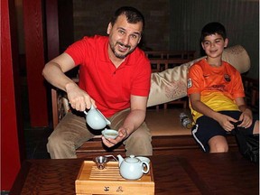 Canadian Salim Alaradi and his son, Mohamed Alaradi, are shown on a family vacation in the United Arab Emirates in a 2013 family photo.