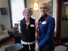 Dianne Martin (L) and Becky Doyle are shown at an Alzheimer's information session on Wednesday, March 23, 2016, at Ye Olde Walkerville Bed and Breakfast in Windsor, Ont. Their husbands have the disease.