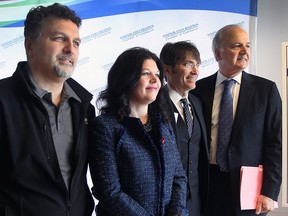 Dino Chiodo (L), president of Unifor Local 444, Patti France, president St. Clair College, Matt Marchand, president/CEO Windsor-Essex Regional Chamber of Commerce and Allan Conway, dean of the University of Windsor Odette School of Business are shown during a media conference on Thursday, March 3, 2016, at the St. Clair College. They spoke about the upcoming policy and solutions forum.