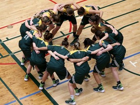 The St. Clair College Saints get their emotions up before battling in a CCAA Women's Basketball Championships held at St. Clair College in Windsor, Ont. on March17, 2016.
