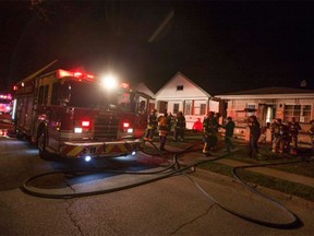 Windsor fire crews work to douse a blaze at 1649 Hall Ave. on March 19, 2016.