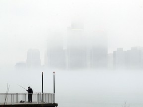 The Detroit skyline is buried in a thick blanket of fog as it is seen form Windsor on Thursday, March 10, 2016.
