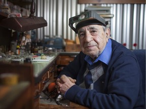 Harry Dokmecian, owner of Weeks Jewellers, sits at his watchmakers desk at his store in downtown Windsor on March 11, 2016.