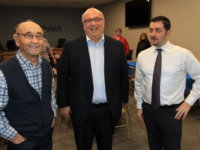 Dan DiGiovanni, centre, longtime CAO of Kingsville, was joined by Mayor Nelson Santos, right, and former Kingsville mayor, Don Clark at town hall March 11, 2016.