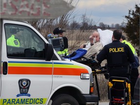 A motorist is taken to hospital by Essex-Windsor EMS paramedics for precautionary reasons following a two-car collision on Arner Townline and Road 9 West Friday March 18, 2016.