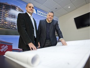 David Mady, left, former president of Mady Development Corporation and his father Charles Mady, founder and CEO, are pictured at their Markham, Ont. offices March 21, 2013.