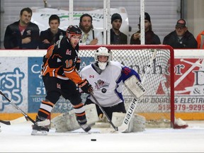 Essex 73's forward Tyler Boughner, seen in action last season against Dorchester Dolphins goaltender Riley Brown, is one of 16 players returning to the team this season.