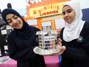 Zainab Khalaf and Lila Aniza (right) present their project during the An Noor science fair at An Noor School in Windsor on Wednesday, March 9, 2016. Students from Grade 3 to 8 presented their projects which were judged by volunteers.