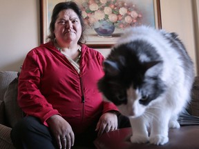 Sherry Karolev, 52, is a client and volunteer with the Canadian Mental Health Association. She is shown at her Windsor, Ont., apartment on March 18, 2016.