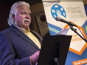 Windsor-Tecumseh MPP, Percy Hatfield, speaks at a news conference announcing a Pathway to Potential and Family Services Windsor-Essex study exploring a new Collective Impact model to achieve poverty reduction goals in Windsor-Essex, while at the Windsor Star News Cafe, Friday, March 11, 2016.