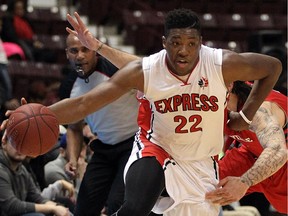 The Windsor Express' Shaquille Keith cuts around the Orangeville A's Jameson Tipping at the WFCU Centre in Windsor on Friday, February 26, 2016.