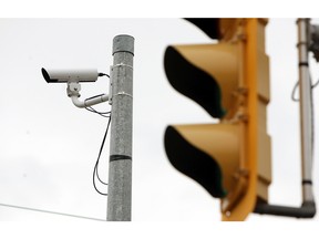 In this file photo, a traffic camera keeps watch over the intersection of Ouellette Avenue and Tecumseh Road in Windsor on Wednesday, March 6, 2013. (TYLER BROWNBRIDGE / The Windsor Star)