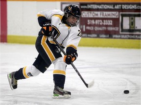Lancers Erinn Noseworthy fires a shot toward during women's hockey action at South Windsor Arena on Nov. 21, 2014.