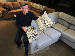 Dave Locke at We Love Windsor Furniture Bank on Marion Avenue displays furniture donated by Essex Home Furnishings on Tuesday March 29, 2016.