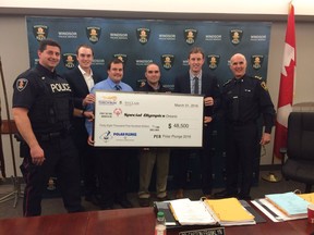 Organizers of the 2016 Polar Plunge present a cheque for $48,500 to Special olympics Ontario on March 31, 2016.
