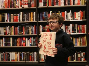 St. William Catholic Elementary School senior kindergarten student Liam Fitzmaurice is all smiles after reading his stories at the Indigo St. Clair Shores book store on March 7, 2016. Liam, an aspiring young writer, has written several chapter books with ambitions to one day have them published.