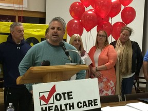 Ken Lewenza Jr., chairman of the Windsor Health Coalition, speaks to the crowd gathered for the launch of the Windsor Health Coalition Health Cuts Referendum at the new campaign office at 3719 Walker Rd. on Monday, April 25, 2016