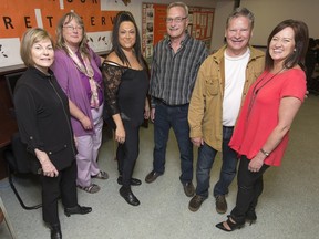 Committee members and service providers from the UFCW Local 459 Action Centre, from left, Debra Didomenico, Vivian Whaley, Helene Cain, Mark Van, Mark Stasso, and Laura Lucier attend an event to say farewell to the Action Centre, Friday, April 22, 2016.