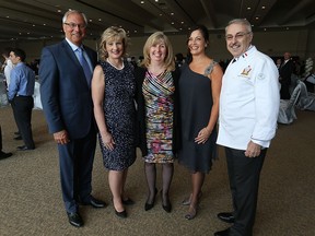 Tony Haddad, Mary Wilk, Beverly Clark, Veronica Friesen and Vincenzo Del Duca (left to right) attend the St. Clair College Alumni of Distinction gala at the St. Clair Centre for the Arts in Windsor on Friday, April 1, 2016.
