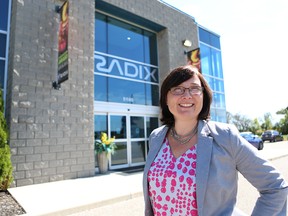 Shelley Fellows, shown in front of RadixInc. where she is Vice President of Operations, is this year's ATHENA Award winner.