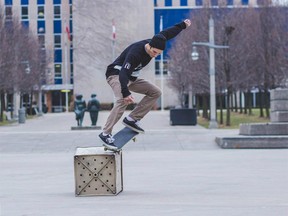 Ryan Barron skateboarding in downtown Windsor, April 2015.