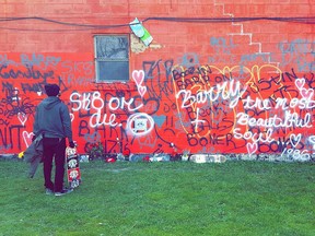 Graffiti tributes to deceased Windsor skateboarder Ryan Barron cover a wall near Atkinson Memorial Skate Park in Windsor.