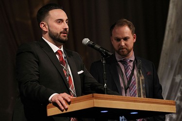 Kyle Devine (left) accepts the New Business of the Year Award during the 2016 BEA awards at Caesars Windsor in Windsor on Tuesday, April 20, 2016.
