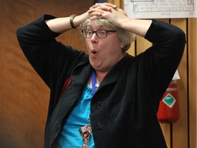 WINDSOR, ON. APRIL 25, 2016 -  Marlene Westfall reacts to a statement made by David Musyj, president and CEO of Windsor Regional Hospital during at a special Windsor city council meeting regarding the hospital levy on Monday, April 25, 2016. Musyj stated there was community input in the mega-hospital process which Westfall found surprising. (DAN JANISSE/The Windsor Star)
