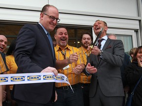 Windsor Mayor Drew Dilkens, left, Stefan Sjostrand IKEA Canada president and Rudy Irish, centre, IKEA's acting manager, joined with staff and customers for the official opening of IKEA Pickup and Order Point location at 4115 Walker Road, Monday April 4, 2016.