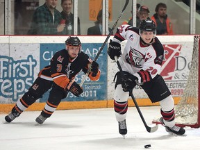 Riley Meyerink (L) of Essex chases Jordan Pettitt of Ayr during their game on Tuesday, April 5, 2016, at the Essex Centre Sports Complex.