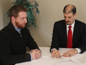 Bosko Kacarevic, who founded Windsor’s only locally owned and operated Exempt Market Dealer Kindigo Capital Ltd., consults with a client.