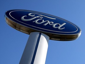 A Ford logo sign is shown in this file photo from 2016.