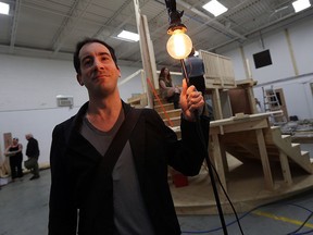 Jeffery Bastien is photographed near the under construction set for the latest production from the Ghost Light Players in Windsor on Monday, April 18, 2016.