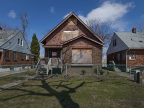 Houses on the 700 block of Indian Road sit boarded up and vacant, Wednesday, April 13, 2016.