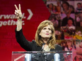 Runner up Sandra Pupatello waves to the crowed after being defeated by Kathleen Wynne at the Ontario Liberal Leadership convention in Toronto on Saturday, January 26, 2013.