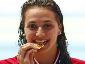 LaSalle swimmer Kylie Masse won gold in the 100-metre backstroke at the Summer Universiade in Gwangju, South Korea on July 7, 2015.