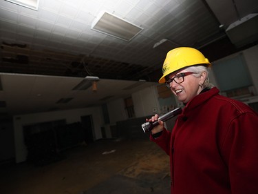 Kitty Pope tours the former firehall in Sandwich in Windsor on Thursday, April 7, 2016. The building is going to be converted to a new library.