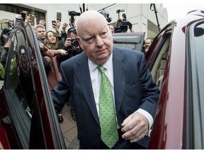Sen. Mike Duffy leaves the courthouse at the conclusion of his trial on Thursday, April 21, 2016 in Ottawa. Duffy has been cleared of all 31 fraud, breach of trust and bribery charges he had been facing in relation to the long-running Senate expense scandal.