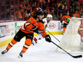 Shayne Gostisbehere #53 of the Philadelphia Flyers takes the puck in the third period against the Ottawa Senators at the Wells Fargo Center on April 2, 2016 in Philadelphia, Pennsylvania.The Philadelphia Flyers defeated the Ottawa Senators 3-2.