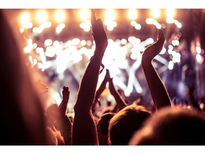 People celebrating and partying at a festival. Photo by fotolia.com.