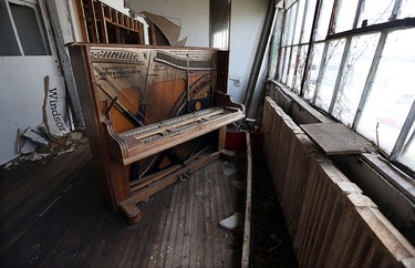 An old piano remains in the Walker Power Building in Windsor on Tuesday, April 20, 2016. The building, which was built in 1911, has been sold.
