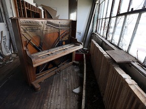 An old piano remains in the Walker Power Building in Windsor on Tuesday, April 20, 2016. The building, which was built in 1911, has been sold.