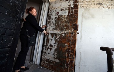 Real estate agent Barbara Oczachowski tours the Walker Power Building in Windsor on Tuesday, April 20, 2016. The building, which was built in 1911, has been sold.