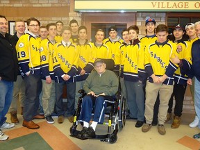 LaSalle Midget Major AA players visit with the residents of Aspen Lake.
