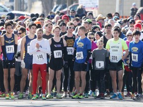Runners wait to start the Running Factory's 22nd annual Spring Thaw 5k run in Olde Riverside on  Sunday, March 29, 2015.