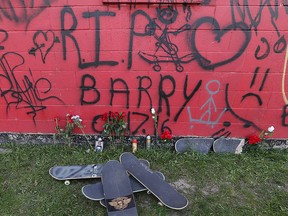 Skateboards and spray-painted slogans pay tribute to Ryan Barron at Atkinson Memorial Skate Park in Windsor on April 18, 2016. Barron died the day before, the victim of a hit-and-run collision while he was skateboarding in Vancouver, B.C.